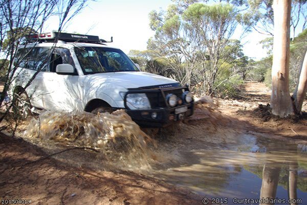 Going through a puddle on the Cave Hill WoodlinesTrack