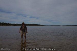 Standing in the shallow water of Googs Lake, South Australia