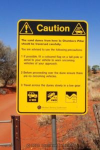 Sign at the edge of Chambers Pillar Historical Reserve, NT.