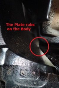 The Asfir skid plate rubs on the Pajero's lower RH side panel.