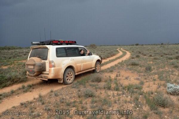 On the track with a Storm coming near Warbla Cave North of the Old Eyre Highway, SA.