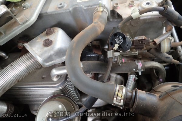 The Pajero crankcase breather hose.