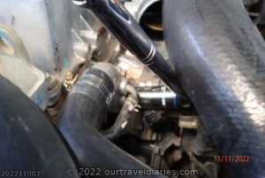 Remove engine coolant temperature sensor