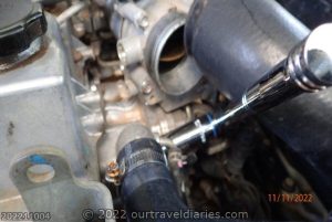 Remove engine coolant temperature sensor